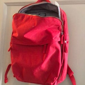 Red canvas backpack